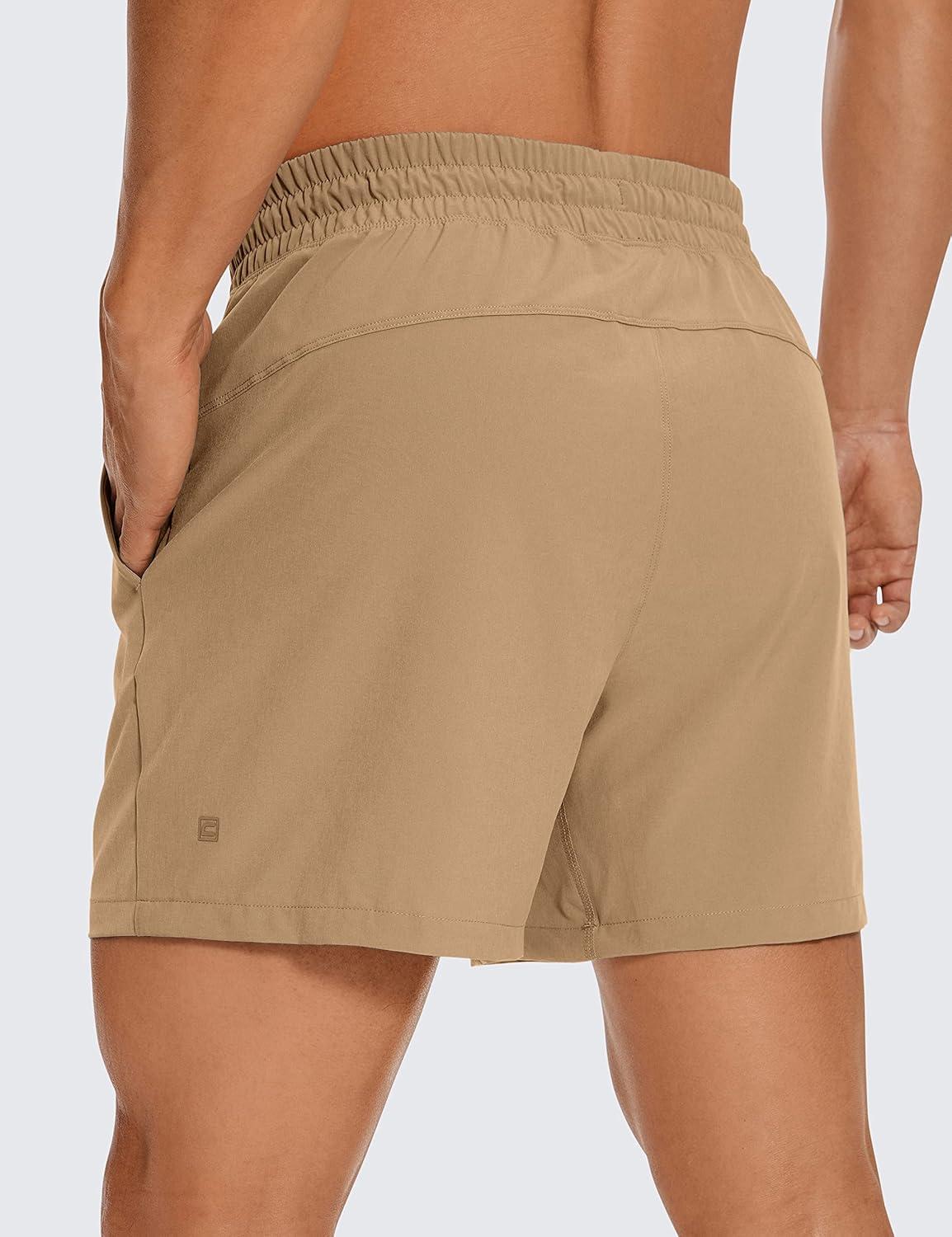 imageCRZ YOGA Mens Linerless Workout Shorts  5 Lightweight Quick Dry for Running Sports Athletic Gym with PocketsKhaki Sand