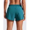 imageCRZ YOGA Athletic Running Shorts for Women V Split Low Waisted Lightweight Gym Workout Athletic Shorts with LinerBorealis Green