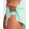 imageCRZ YOGA Athletic Running Shorts for Women V Split Low Waisted Lightweight Gym Workout Athletic Shorts with LinerMint Moment