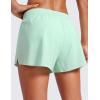 imageCRZ YOGA Athletic Running Shorts for Women V Split Low Waisted Lightweight Gym Workout Athletic Shorts with LinerMint Moment