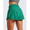 imageCRZ YOGA Athletic Shorts for Women High Waisted Flowy Ruffle Skirt Overlay for Workout Running Tennis with Zip PocketCascadia Green