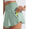 imageCRZ YOGA Athletic Shorts for Women High Waisted Flowy Ruffle Skirt Overlay for Workout Running Tennis with Zip PocketGreen Palm Court