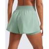 imageCRZ YOGA Double Layer Running Shorts for Women 3quot High Waisted 2 in 1 for Athletic Tennis Workout with Zip PocketsGreen Palm Court