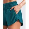 imageCRZ YOGA High Waisted Dolphin Running Shorts for Womens Mesh Liner for Gym Workout Athletic with Zipper PocketBorealis Green