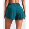 imageCRZ YOGA High Waisted Dolphin Running Shorts for Womens Mesh Liner for Gym Workout Athletic with Zipper PocketBorealis Green