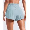 imageCRZ YOGA High Waisted Dolphin Running Shorts for Womens Mesh Liner for Gym Workout Athletic with Zipper PocketLight Grayish Blue