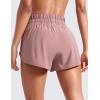 imageCRZ YOGA High Waisted Dolphin Running Shorts for Womens Mesh Liner for Gym Workout Athletic with Zipper PocketTwilight Rose Pink