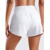 imageCRZ YOGA High Waisted Dolphin Running Shorts for Womens Mesh Liner for Gym Workout Athletic with Zipper PocketWhite