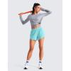imageCRZ YOGA Mid Waisted Dolphin Athletic Shorts for Women 4quot Lightweight High Split for Gym Workout with Liner Quick DryTurquoise