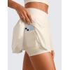 imageCRZ YOGA Tennis Skirts for Women Crossover High Waisted Ruffle Layered Workout Athletic Golf Skort with PocketsWhite Apricot