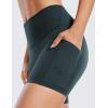 imageCRZ YOGA Womens Butterluxe Biker Shorts with Pockets 5 Inches  High Waisted Volleyball Workout Athletic YogaForest Dark Green