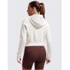 imageCRZ YOGA Womens Fleece Zip Up Cropped Hoodie Workout Jacket Athletic Casual Long Sleeve Sweatshirts with Thumb HolesMilky White Bone