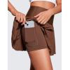 imageCRZ YOGA Womens High Waisted Pleated Tennis Skirts with Pockets Tummy Control Casual Liner A Line Workout Golf SkortsCoffee Brown