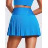 imageCRZ YOGA Womens High Waisted Pleated Tennis Skirts with Pockets Tummy Control Casual Liner A Line Workout Golf SkortsMadagascar Blue