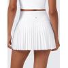 imageCRZ YOGA Womens High Waisted Pleated Tennis Skirts with Pockets Tummy Control Casual Liner A Line Workout Golf SkortsWhite