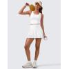 imageCRZ YOGA Womens High Waisted Pleated Tennis Skirts with Pockets Tummy Control Casual Liner A Line Workout Golf SkortsWhite