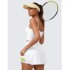 imageCRZ YOGA Womens High Waisted Pleated Tennis Skirts with Pockets Tummy Control Casual Liner A Line Workout Golf SkortsWhite