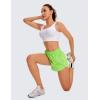 imageCRZ YOGA Womens High Waisted Running Shorts Mesh Liner 3 Dolphin Quick Dry for Athletic Gym Track Workout with Zip PocketGreen Glow