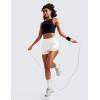 imageCRZ YOGA Womens High Waisted Running Shorts Mesh Liner 3 Dolphin Quick Dry for Athletic Gym Track Workout with Zip PocketMilky White Bone