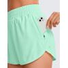 imageCRZ YOGA Womens High Waisted Running Shorts Mesh Liner 3 Dolphin Quick Dry for Athletic Gym Track Workout with Zip PocketMint Moment