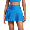 imageCRZ YOGA Womens High Waisted Pleated Tennis Skirts with Pockets Tummy Control Casual Liner A Line Workout Golf SkortsMadagascar Blue