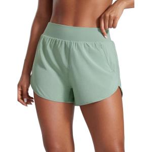 imageCRZ YOGA High Waisted Dolphin Shorts for Women 3quot for Running Athletic Workout Gym with Zipper Pockets LinerGreen Palm Court