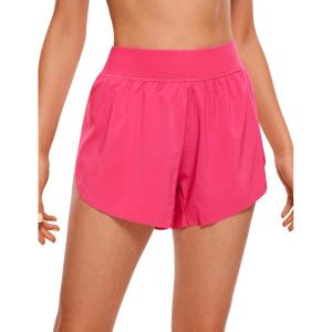 imageCRZ YOGA Mid Waisted Dolphin Athletic Shorts for Women 4quot Lightweight High Split for Gym Workout with Liner Quick DryLip Gloss Pink