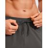 imageCRZ YOGA Athletic Joggers for Men Lightweight Water Resistant Outdoor Workout Pants with Zip PocketsArbor Olive
