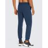 imageCRZ YOGA Athletic Joggers for Men Lightweight Water Resistant Outdoor Workout Pants with Zip PocketsElectric Blue