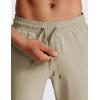 imageCRZ YOGA Athletic Joggers for Men Lightweight Water Resistant Outdoor Workout Pants with Zip PocketsKhali Barley