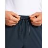 imageCRZ YOGA Athletic Joggers for Men Lightweight Water Resistant Outdoor Workout Pants with Zip PocketsTrue Navy