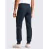 imageCRZ YOGA Athletic Joggers for Men Lightweight Water Resistant Outdoor Workout Pants with Zip PocketsTrue Navy