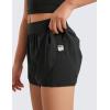 imageCRZ YOGA Girls 2 in 1 Dolphin Athletic Running Shorts with Pockets High Waist Teen Kid Workout Casual Tennis Soccer SplitBlack