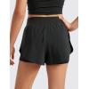 imageCRZ YOGA Girls 2 in 1 Dolphin Athletic Running Shorts with Pockets High Waist Teen Kid Workout Casual Tennis Soccer SplitBlack