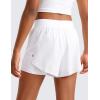 imageCRZ YOGA Girls 2 in 1 Dolphin Athletic Running Shorts with Pockets High Waist Teen Kid Workout Casual Tennis Soccer SplitWhite