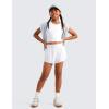 imageCRZ YOGA Girls 2 in 1 Dolphin Athletic Running Shorts with Pockets High Waist Teen Kid Workout Casual Tennis Soccer SplitWhite