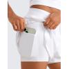 imageCRZ YOGA Girls 2 in 1 Dolphin Athletic Running Shorts with Pockets High Waist Teen Kid Workout Casual Tennis Soccer SplitWhite