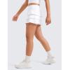imageCRZ YOGA Girls Athletic Ruffle Skirts with Shorts Tennis Golf Dance School Kids Teen Skorts with PocketsWhite
