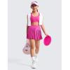 imageCRZ YOGA Girls Pleated Skirt with Shorts Tennis Athletic School Kids Teen Skorts with PocketsHibiscus Purple