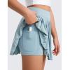 imageCRZ YOGA Girls Pleated Skirt with Shorts Tennis Athletic School Kids Teen Skorts with PocketsLight Grayish Blue