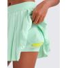 imageCRZ YOGA Girls Pleated Skirt with Shorts Tennis Athletic School Kids Teen Skorts with PocketsMint Moment