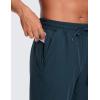 imageCRZ YOGA Mens Linerless Workout Shorts  9 Quick Dry for Running Sports Athletic Gym with PocketsInk Blue