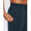 imageCRZ YOGA Mens Linerless Workout Shorts  9 Quick Dry for Running Sports Athletic Gym with PocketsInk Blue