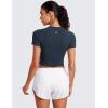 imageCRZ YOGA Seamless Womens Short Sleeve Crop Tops Breathable Slim Fit Gym Workout Shirts Athletic Running Basic Tee TopTwilight Blue