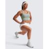 imageCRZ YOGA Strappy Longline Sports Bras for Women  Wirefree Padded Criss Cross Yoga Cropped Tank TopsGreen Palm Court