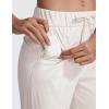imageCRZ YOGA Womens 4Way Stretch Ankle Golf Pants 78 Casual Dress Work Athletic Travel Workout Sweatpants with PocketsMilky White Bone