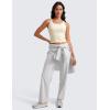 imageCRZ YOGA Womens Butterluxe Double Lined Workout Tank Tops Scoop Neck Racerback Cropped Casual Sleeveless ShirtGloam Yellow Light