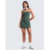 imageCRZ YOGA Womens Butterluxe Tennis Dress Spaghetti Strap Casual Athletic Sports Outfits with Builtin Shorts and BrasDark Forest Green
