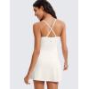 imageCRZ YOGA Womens Butterluxe Tennis Dress Spaghetti Strap Casual Athletic Sports Outfits with Builtin Shorts and BrasMilky White Bone
