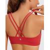 imageCRZ YOGA Womens Light Support Strappy Sports Bra  Low Cut Wirefree Padded Yoga Cami Criss Cross BackCrimson